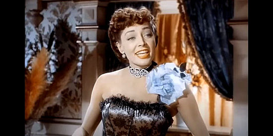 Marie Windsor as Doll Brown, pretending to be a dance hall queen, quite convincingly it turns out, in Hellfire (1949)