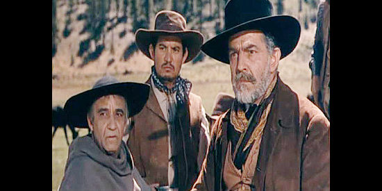 Martin Garralaga as Father Damasco and Ramon Novarro as Don Antonio Chaves, leaders of the caravan headed East from Sante Fe in The Outriders (1950)