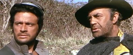 Massimo Carocci as Sgt. Scott with his commander Maj. Droster (Eduardo Fajardo) looking for the ranger in Shango (1970)