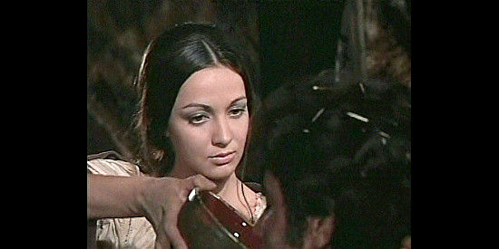 Nadia Marconi as Juana, helping Miguel when he's being held by Moxon's men in Hate for Hate (1967)
