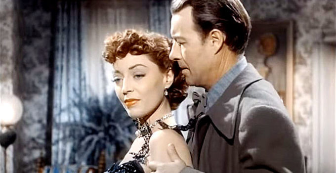 Marie Windsor as Doll Brown and William Elliott as Zeb Smith in Hellfire (1949)