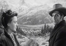 Ann Baxter as Cal and Dale Robertson as John Oakhurst, undesirables kicked out of town in The Outcasts of Poker Flat (1952)