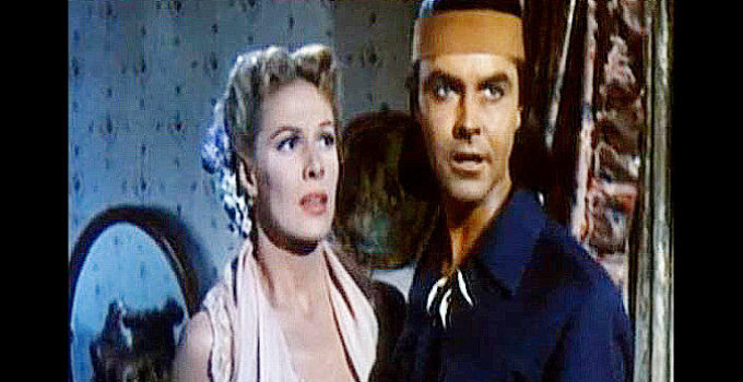 Jack Buetel as Charlie Wolf, realizing he misunderstood the intentions of a white woman (Janis Carter as Helen Dalhen) in The Half-Breed (1952)