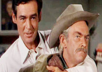 Robert Ryan as Dan Hammond, trying to use dad Ira (John McIntire) to get out of a jam in Horizons West (1952)