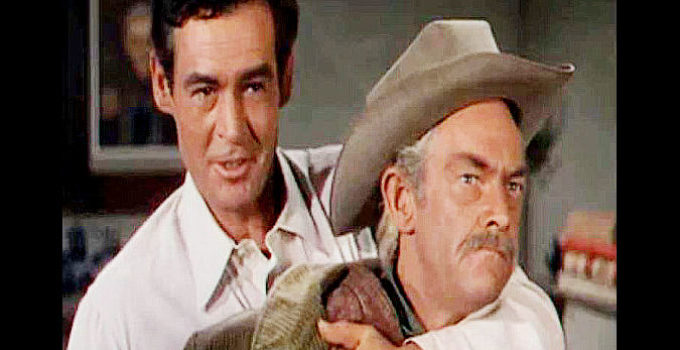 Robert Ryan as Dan Hammond, trying to use dad Ira (John McIntire) to get out of a jam in Horizons West (1952)