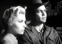 Rosanna Rory as Maria and Dale Robertson as Caleb Whales, trying to avoid trouble with outlaws in Hell Canyon Outlaws (1957)