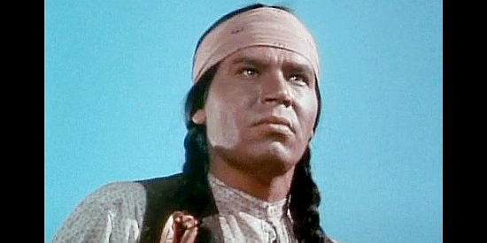 Pat Hogan as Dark Thunder, the Indian chief Del Stewart has been providing with repeating rifles in Overland Pacific (1954)