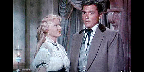 Peggie Castle as Ann Dennison, ready to marry Del Stewart (William Bishop) in spite of her father's objections in Overland Pacific (1954)