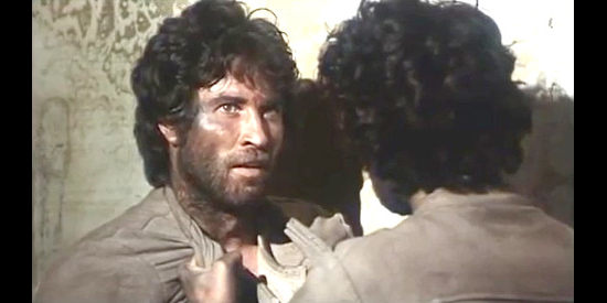 Peter Martell as Silver, in a disagreement with Chuck Moll in The Unholy Four (1970)