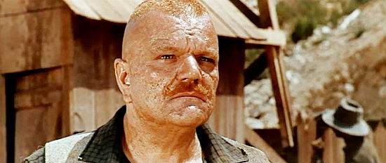 Poldo Bendandi as Sgt. Corky, trying desperately to help Benson hold onto his mine in Seven Guns for Timothy (1966)