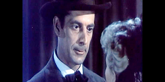 Reed Hadley as Frank Crawford, obsessed with the idea of making Helen Dalhen one of his possessions in The Half-Breed (1952)