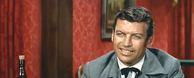 Richard Egan as Jehu, the saloon owner who makes money off pretty Callie in These Thousand Hills (1959)