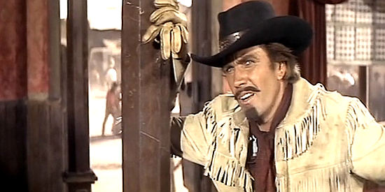 Rik Van Nutter (Clyde Rogers) as Buffalo Bill, wondering about Wild Bill's motivation in Seven Hours of Gunfire (1965)
