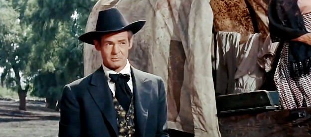 Robert Ryan as Nathan Stark, a man with plans to rule all of Montana and make Nella his woman in The Tall Men (1955)
