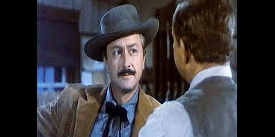 Robert Young as Dan Craig, arriving in San Remas with a reputation as a trouble-making gambler in The Half-Breed (1952)