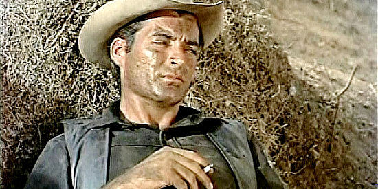 Rory Calhoun as mercenary fighter Tom Bryan, holed up with revoluntionary Juan Castro in The Treasure of Pancho Villa (1955)