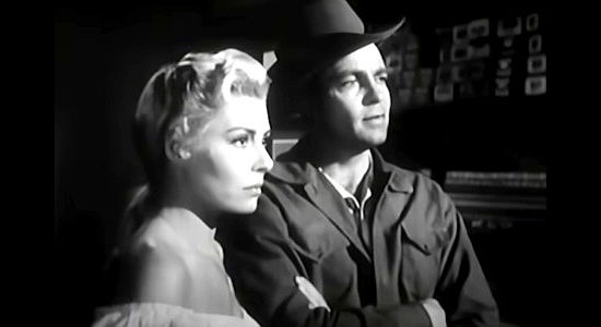 Rosanna Rory as Maria and Dale Robertson as Caleb Whales, trying to avoid trouble with outlaws in Hell Canyon Outlaws (1957)