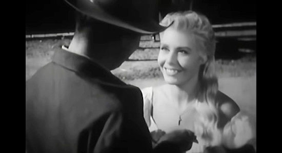 Rosanna Rory as lovely Maria, promising to chook the sheriff a delicious chicken dinner in Hell Canyon Outlaws (1957)