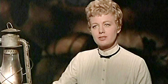 Shelley Winters as Ruth Harris, the school teacher who finds herself falling for the mercenary Tom Bryan in The Treasure of Pancho Villa (1955)