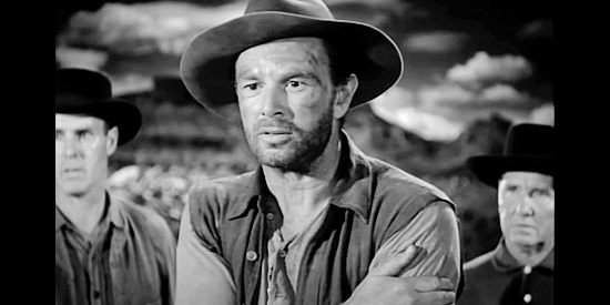Sterling Hayden as Gil Hanley, an innocent man condemned to prison in Hellgate (1952)