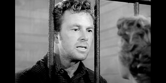 Sterling Hayden as Gil Hanley, leading with his wife for help proving his innocence in Hellgate (1952)