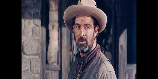 Ted de Corsia as Bye, the Quantrill man sent to accompany Will Owens and his colleagues on their mission in The Outriders (1950)