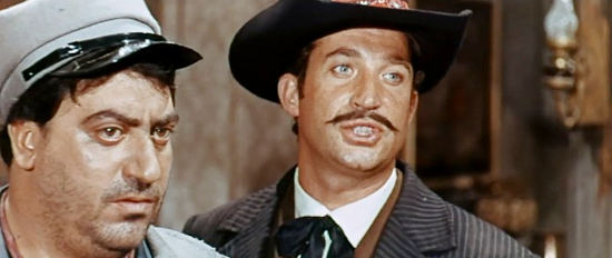 Tito Garcia as Abel and Frank Oliveras as Bert, two of the men Sgt. Corky recruits in Seven Guns for Timothy (1966)