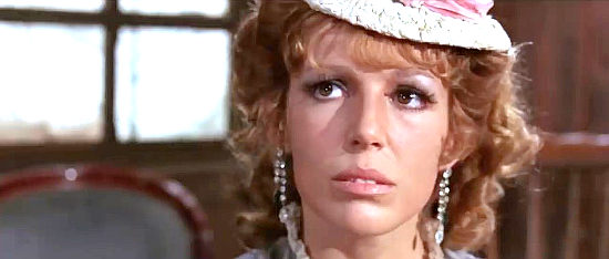 Victoria Zinny as Eleanor Oswald, the woman who married for money in Shoot the Living ... Pray for the Dead (1971)