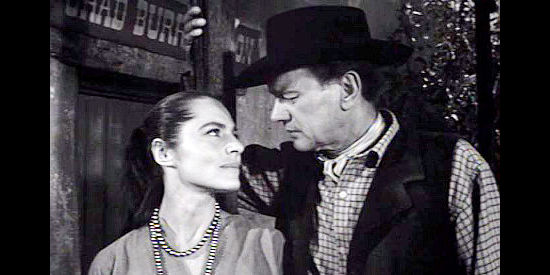 Viveca Lindfors as Aleta Burris with Daniel Halliday (Joseph Cotton), the man who loves her in The Halliday Brand (1957)