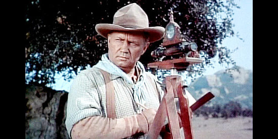 Walter Sande as Mr. Dennison, trying to build a railroad and suspicious of Del Stewart's motives in Overland Pacific (1954)