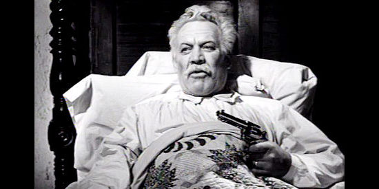 Ward Bond as Big Dan Halliday, ready to even a score from his death bed if necessary in The Halliday Brand (1957)