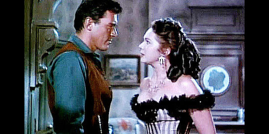 William Bishop as Del Stewart with Jessie Loraine (Adele Jergens), a former flame tired of his antics in Overland Pacific (1954)