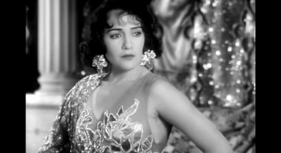 Bebe Daniels as Rita Ferguson, torn over her feelings for Capt. Jim Stewart in Rio Rita (1929)