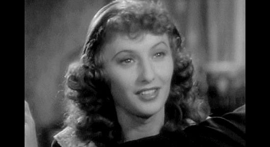 Barbara Stanwyck as Annie Oakley, falling for the man who's supposed to be her rival in Annie Oakley (1935)