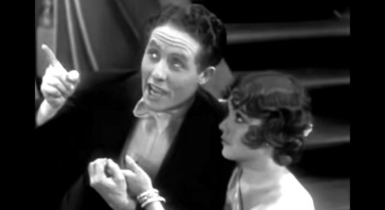 Bert Wheeler as Chick Dean and Dorothy Lee as his new wife Dolly in Rio Rita (1929)