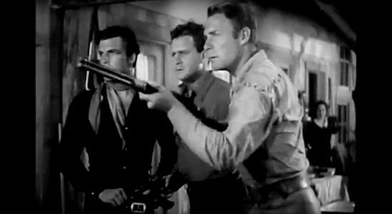 Billy Hayden (Buster Crabbe), Neil Stanley (Barton MacLane) and Lynn Hayden (Randolph Scott), ready to defend their home in To the Last Man (1933)