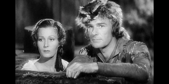 Binnie Barnes as Alice Munro and Randolph Scott as Hawkeye, wondering what's ahead with the fort under seige in Last of the Mohicans (1936)