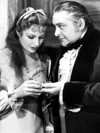 Binnie Barnes as Countess Elizabeth Bartoffski and Edward Arnold as John Sutter in Sutte's Gold (1936)