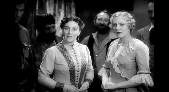Blanche Friderici as Mrs. McSween introducing Clarie Randall to Billy in Billy the Kid (1930)