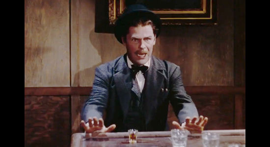 Brian Donlevy as Barshee, the man responsible for the death of Mrs. Samuels, coming face-to-face with Jesse in Jesse James (1939)