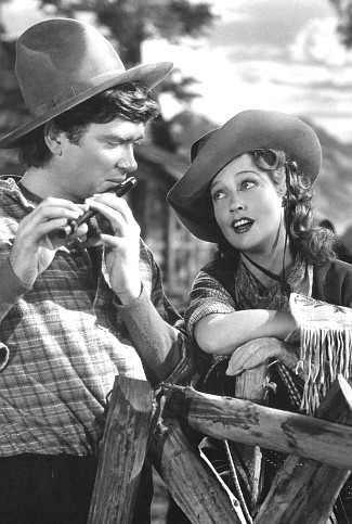 Buddy Ebsen as Alabama and Jeanette MacDonald as Mary Robbins in The Girl of the Golden West (1938)