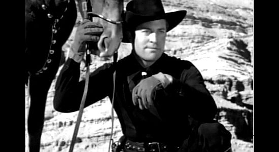 Chester Morris as Bob Sangster, readdy to rob the sanctimonious town where he grew up in Three Godfathers (1936)