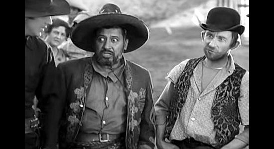 Chris-Pin Martin as Santiago and Roscoe Ates as Old Stuff, friends of Billy in Billy the Kid (1930)