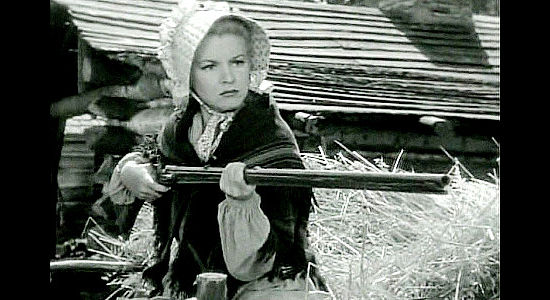 Claire Trevor as Janie MacDougall, insisting on taking a wounded JIm Smith to a doctor in Allegheny Uprising (1939)