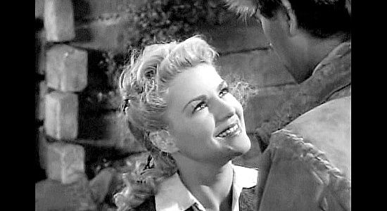 Claire Trevor as Janie MacDougall, reacting to Jim Smith's return from captivity with the Indians in Allegheny Uprising (1939)