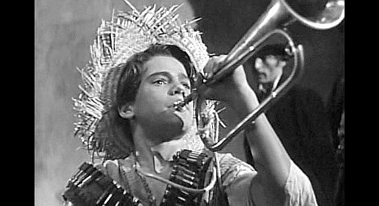 David Durand as the young boy who insists on joining Pancho's revolutionary army as a buglar in Viva Villa! (1934)