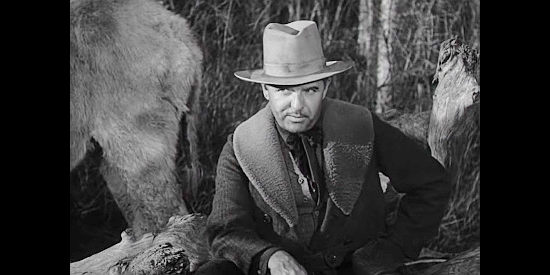 Frank Conroy as John Blake, Claire's husband and partner in the search for gold in Call of the Wild (1935)