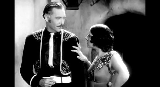 Georges Renavent as Gen. Ravinoff, dismissing a female friend because of his love for Rita in Rio Rita (1929)