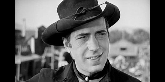 Humphrey Bogart as Whip McCord, reacting to a first glimpse of the gold designated for payment to the Indians in The Oklahoma Kid (1939)