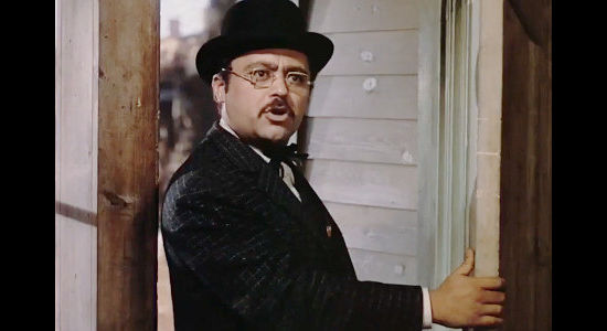J. Edward Bromberg as Mr. Runyan, spreeading word of a scheme to catch Jesse in Jesse James (1939)